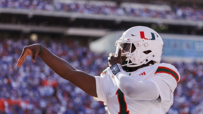 Miami QB Cam Ward celebrates during a game vs. Florida.