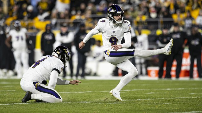 Justin Tucker kicks a field goal during an NFL game between the Steelers and Ravens.