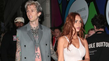 Megan Fox Covers Her Entire Body In Black Paint To Announce She’s Pregnant With MGK’s Baby