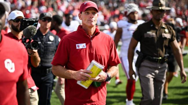 Oklahoma football coach Brent Venables walks onto the field after a game.