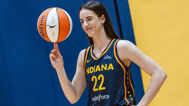 caitlin clark spinning a basketball