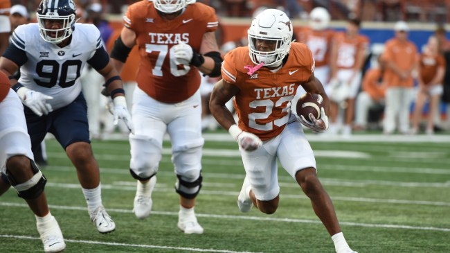 Texas running back Jaydon Blue carries the football vs. BYU.