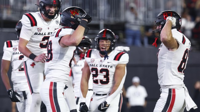 Ball State football players celebrate a touchdown vs. Vanderbilt.