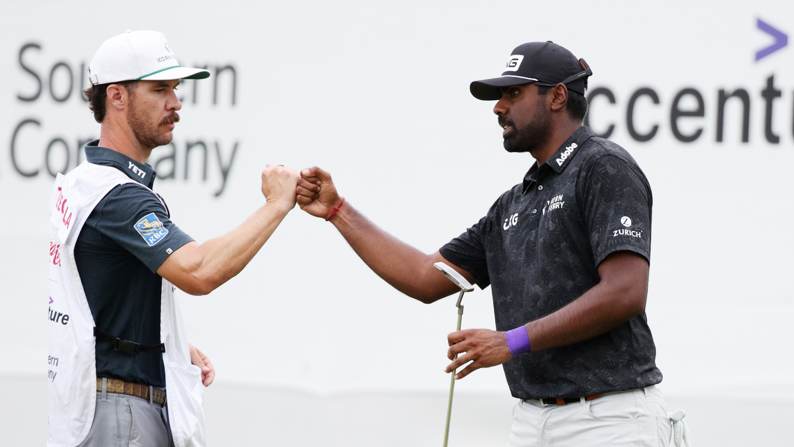 Sahith Theegala and caddie Carl Smith