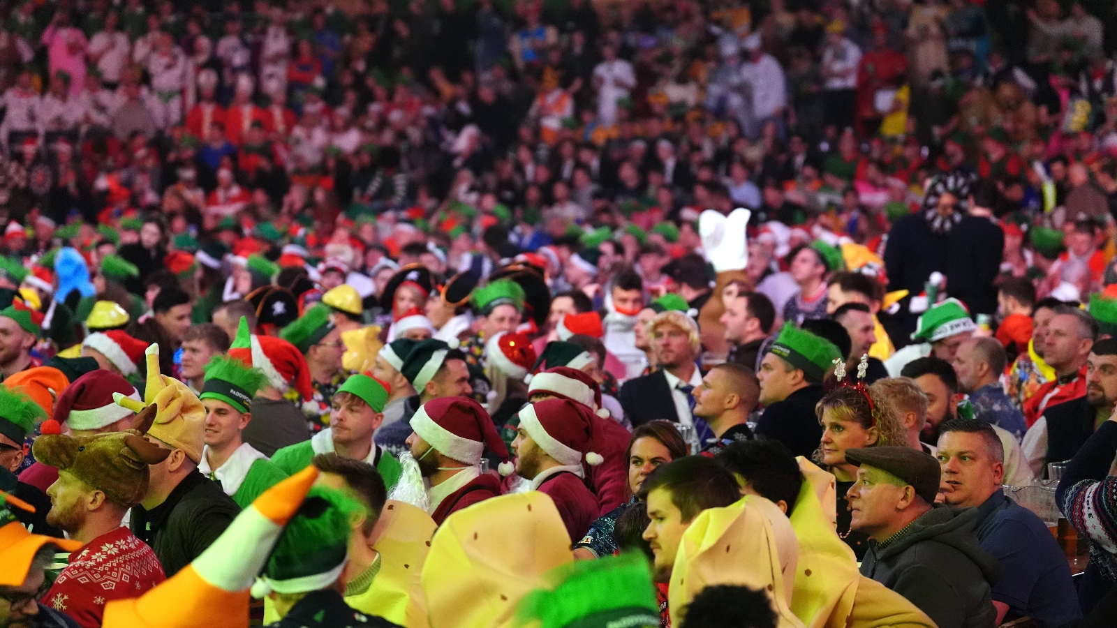 crowd goes wild at the 2024/5 Darts World Championship at Alexandra Palace in North London