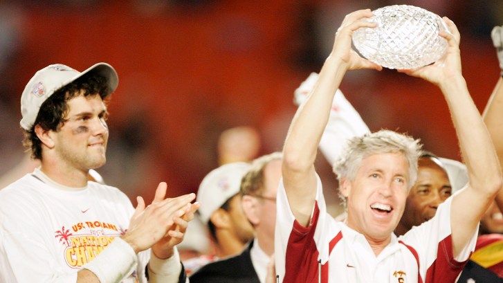 Matt Leinart next to Pete Carroll after national championship win in 2005