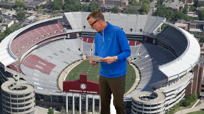 Alabama AD Greg Byrne pictured over a background of Bryant-Denny Stadium.