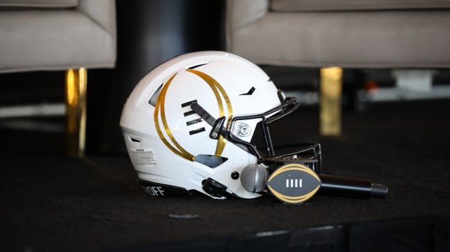 A College Football Playoff logo on a helmet.