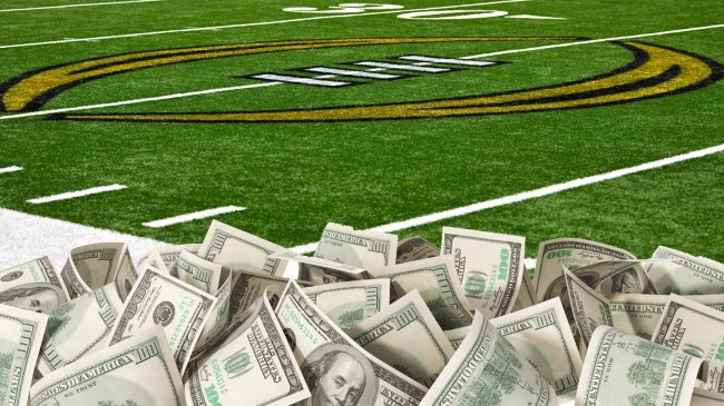 A College Football Playoff logo on the field.