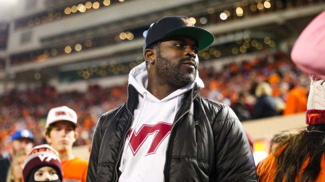 Former Virginia Tech QB Michael Vick on the sidelines during a Hokies football game.