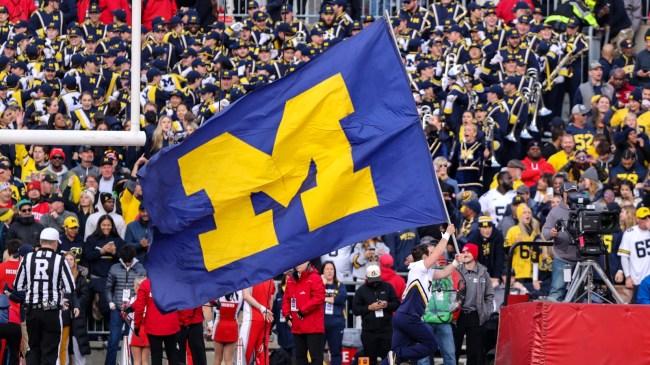 A Michigan flag flies during a football game between the Wolverines and Ohio State Buckeyes.