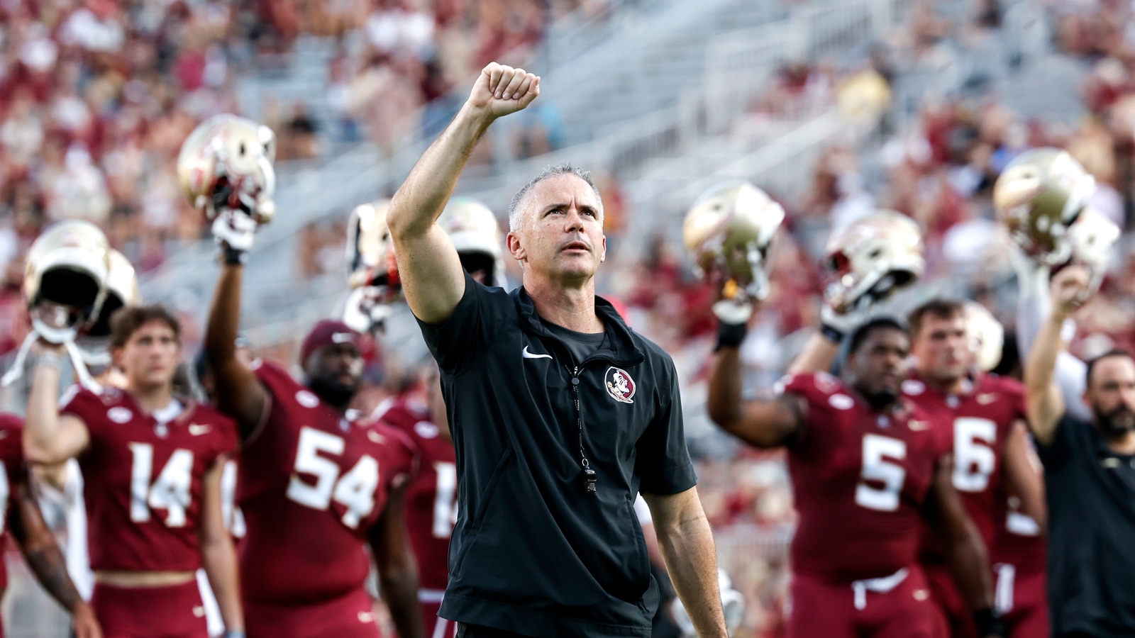 Florida State Seminoles head coach Mike Norvell on the field