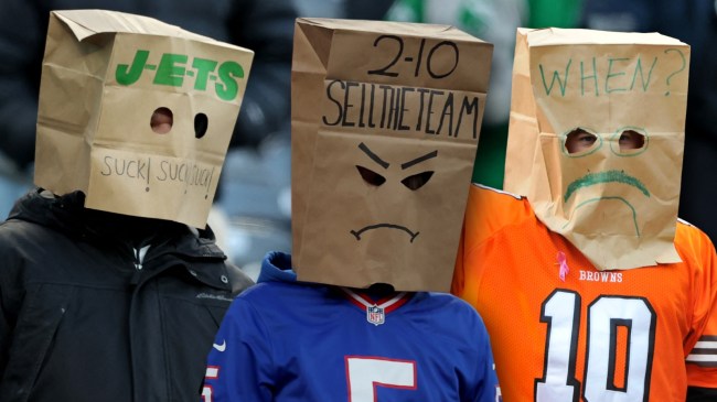NFL fans with paper bags on their heads
