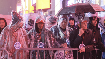 People In Times Square Hit With Freezing Cold Rain Hours Before NYE Ball Drop