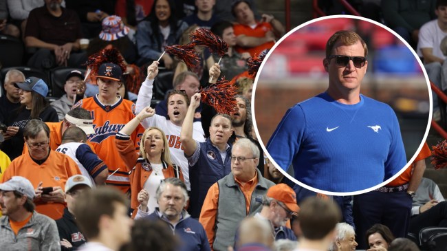 SMU football coach Rhett Lashlee pictured over Auburn fans.