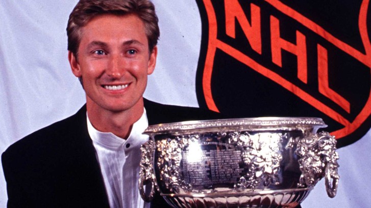 Wayne Gretzky with Art Ross Trophy