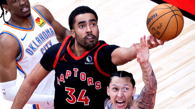 Jontay Porter of Toronto Raptors fights for rebound