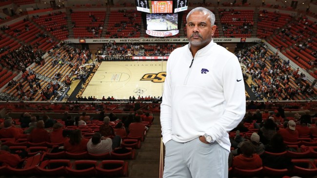 Kansas State basketball coach Jerome Tang pictured over a background of Gallagher-Iba Arena.