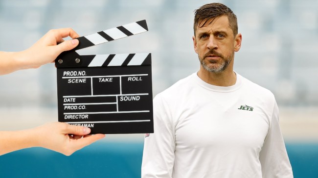 New York Jets QB Aaron Rodgers on the field before a game.