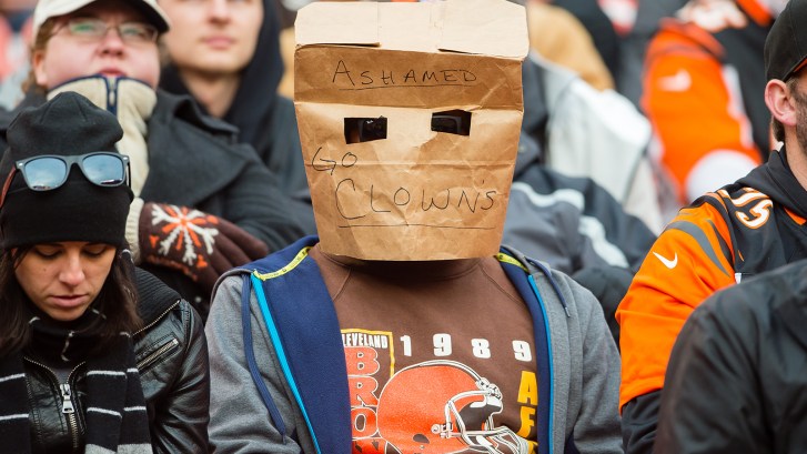 Browns fan wearing paper bag