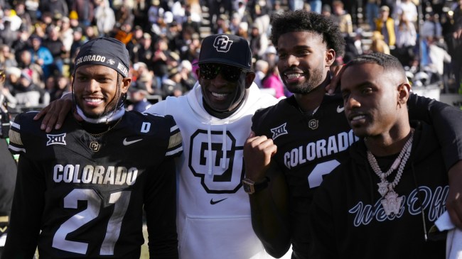 Deion Sanders on the field with his sons at Colorado senior day.