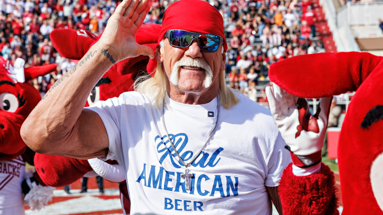 Hulk Hogan wearing a Real American Beer t-shirt