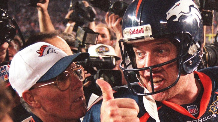 John Elways celebrates after winning Super Bowl XXXII