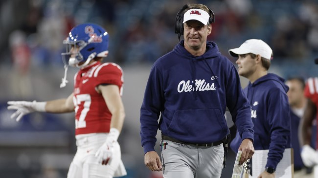 Ole Miss football coach watches from the sidelines during a game vs. Duke.