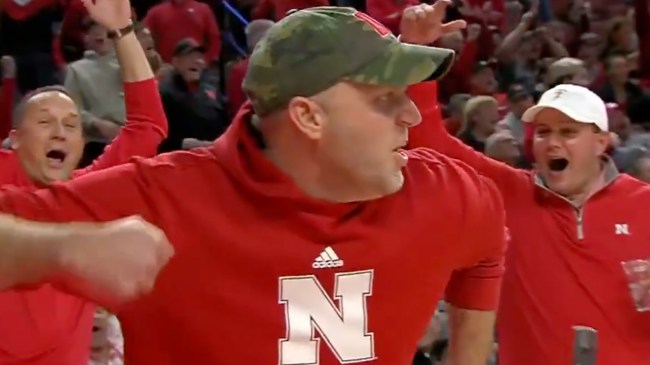 Nebraska fan celebrates after making putt to nail Porsche