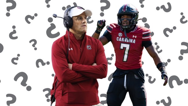 South Carolina Gamecocks football coach Shane Beamer pictured beside safety Nick Emmanwori.