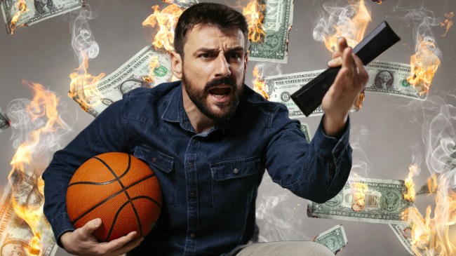 A basketball fan watches a game.