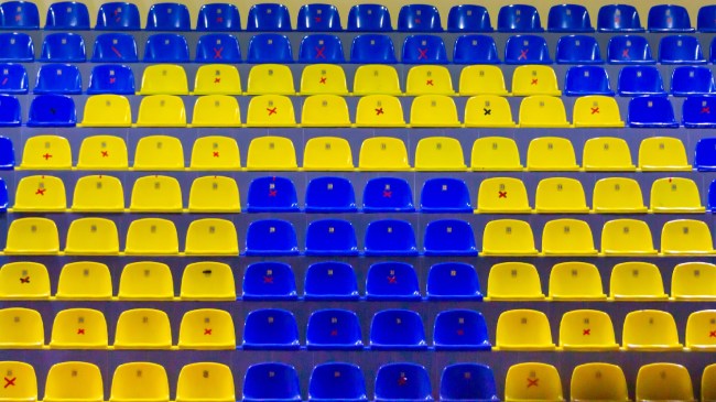 A view of empty seats at a basketball arena.