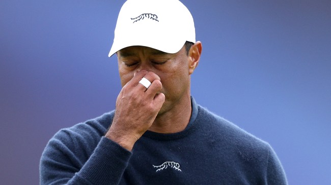 Tiger Woods wearing Sun Day Red apparel