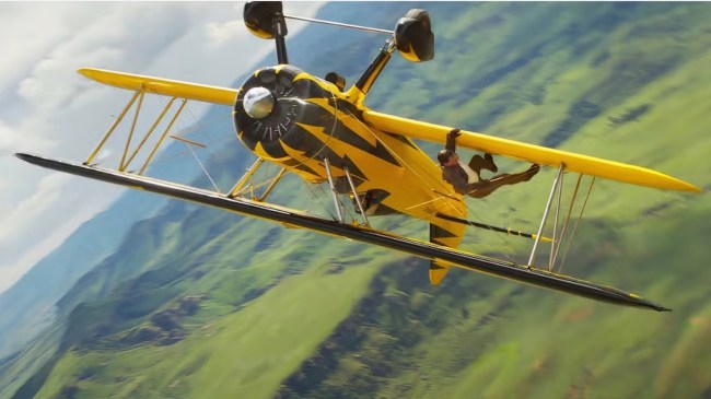 tom cruise hanging off a plane