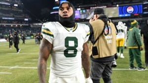 Green Bay Packers running back Josh Jacobs walks off the field.