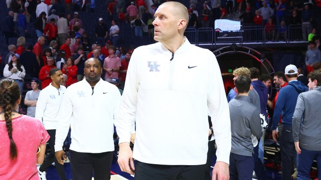 Kentucky basketball coach Mark Pope walks onto the floor.