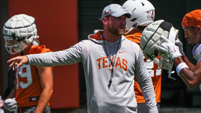Texas football coach Blake Gideon on the field.