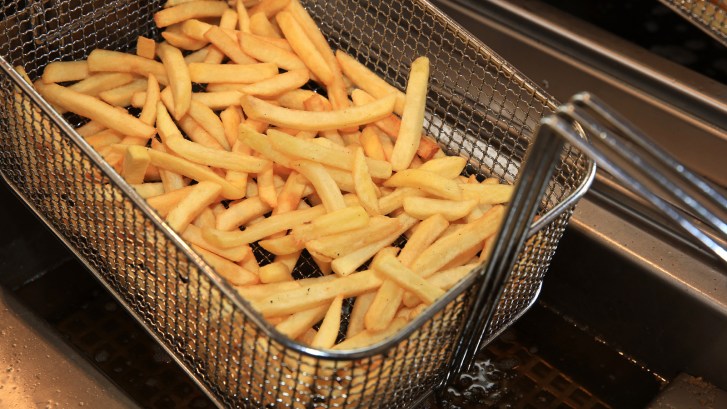 french fries in deep fryer