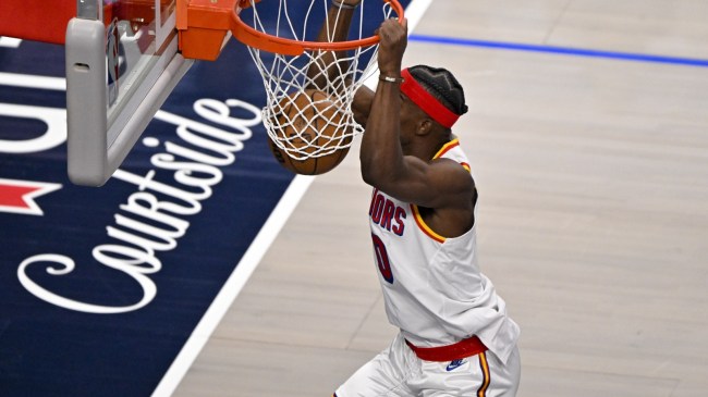 Jimmy Butler dunks the ball for the Golden State Warriors.