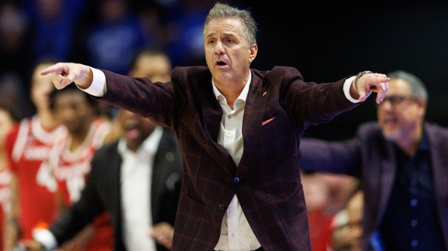 Arkansas basketball coach John Calipari calls a play into his team.