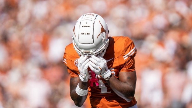 Texas WR Johntay Cook react on the field.