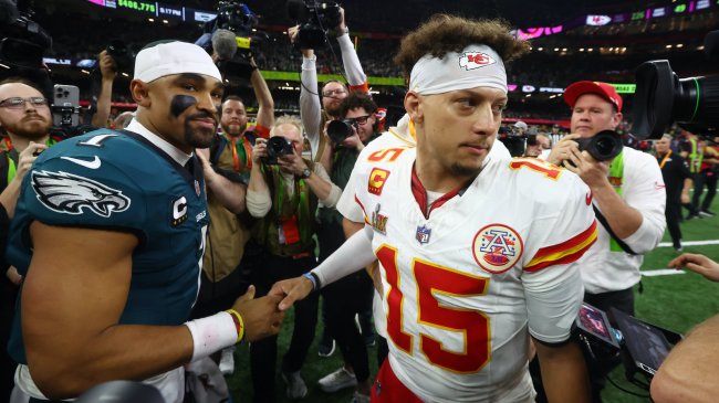 Feb 9, 2025; New Orleans, LA, USA; Philadelphia Eagles quarterback Jalen Hurts (1) shakes hands with Kansas City Chiefs quarterback Patrick Mahomes (15) after Super Bowl LIX at Ceasars Superdome. Mandatory Credit: Mark J. Rebilas-Imagn Images