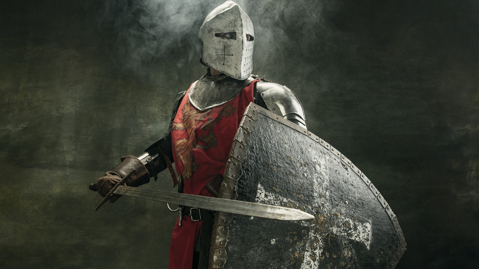 medieval knight wearing full combat armor