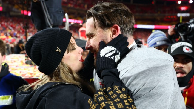 Jan 26, 2025; Kansas City, MO, USA; Recording artist Taylor Swift and Kansas City Chiefs tight end Travis Kelce (87) react after the AFC Championship game against the Buffalo Bills at GEHA Field at Arrowhead Stadium. Mandatory Credit: Mark J. Rebilas-Imagn Images