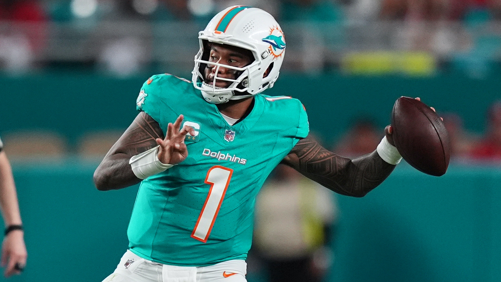 Dec 22, 2024; Miami Gardens, Florida, USA; Miami Dolphins quarterback Tua Tagovailoa (1) attempts a pass against the San Francisco 49ers during second half at Hard Rock Stadium. Mandatory Credit: Jasen Vinlove-Imagn Images