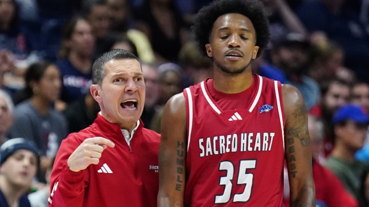 Sacred Heart coach Anthony Latina with player