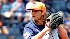 Houston Astros pitcher Steven Okert throws a pitch