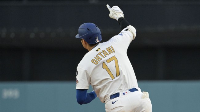Shohei Ohtani reacts after hitting a solo home run