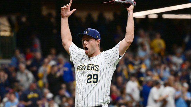Milwaukee Brewers pitcher Trevor Megill walks off the field.
