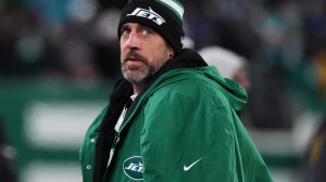 Jan 5, 2025; East Rutherford, New Jersey, USA; New York Jets quarterback Aaron Rodgers (8) during the third quarter of their game against the Miami Dolphins at MetLife Stadium. Mandatory Credit: Ed Mulholland-Imagn Images